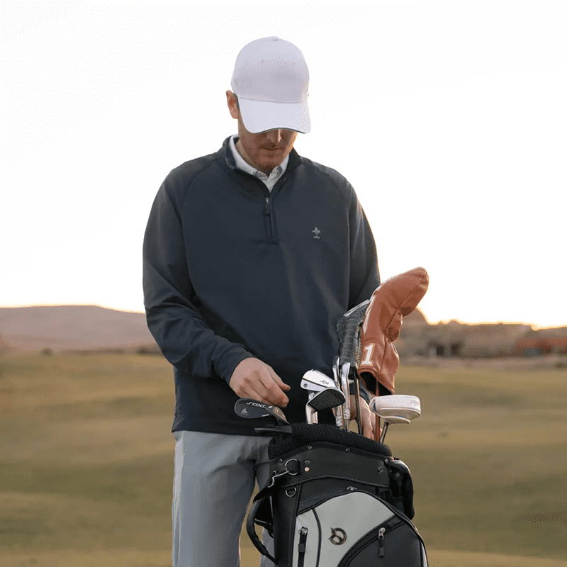 Person preparing for a golf game