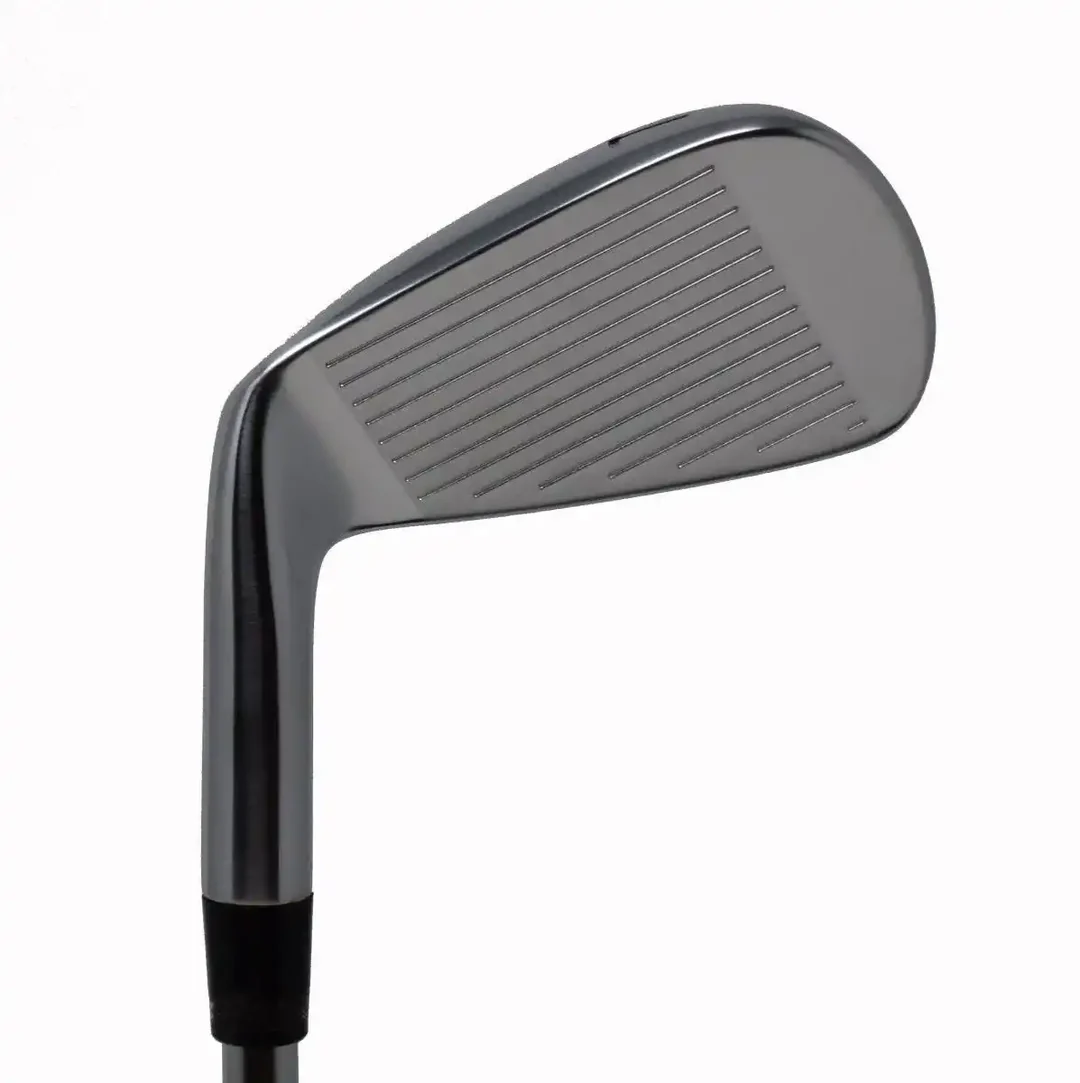 Golf iron with grooves